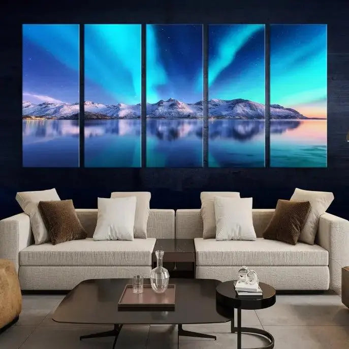 The room features the "Northern Lights above Mountain Wall Art Canvas Print," showcasing a triptych of the aurora borealis over snowy mountains and a lake. Professionally crafted frames on museum-quality canvases are highlighted in the modern decor.