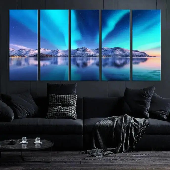 The room features the "Northern Lights above Mountain Wall Art Canvas Print," showcasing a triptych of the aurora borealis over snowy mountains and a lake. Professionally crafted frames on museum-quality canvases are highlighted in the modern decor.