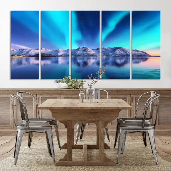 The room features the "Northern Lights above Mountain Wall Art Canvas Print," showcasing a triptych of the aurora borealis over snowy mountains and a lake. Professionally crafted frames on museum-quality canvases are highlighted in the modern decor.