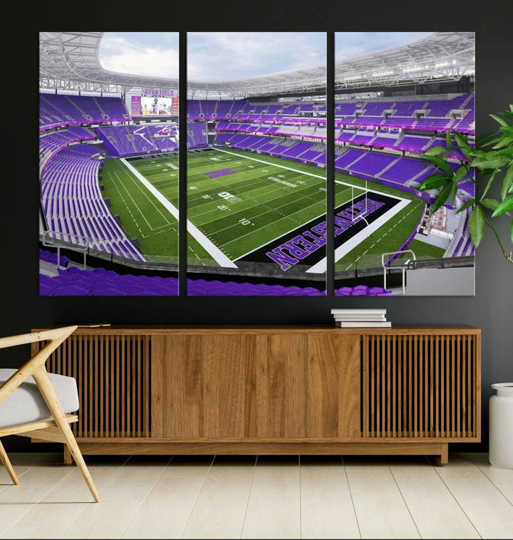 A Northwestern University Wildcats Football Team print of Evanston Ryan Field, featuring a purple-themed football stadium, elegantly hangs on the wall. This wall art boasts a gallery-quality finish on premium canvas to add sophistication to any space.