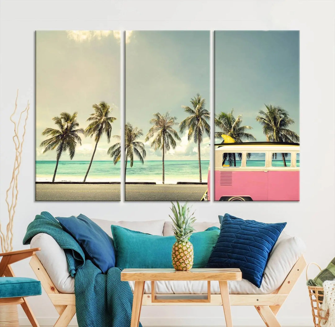 The Nostalgia Lovely Summer Day Canvas Wall Art Print in the modern living room showcases a tropical triptych with palm trees and a vintage van on museum-quality canvases, ready to hang.