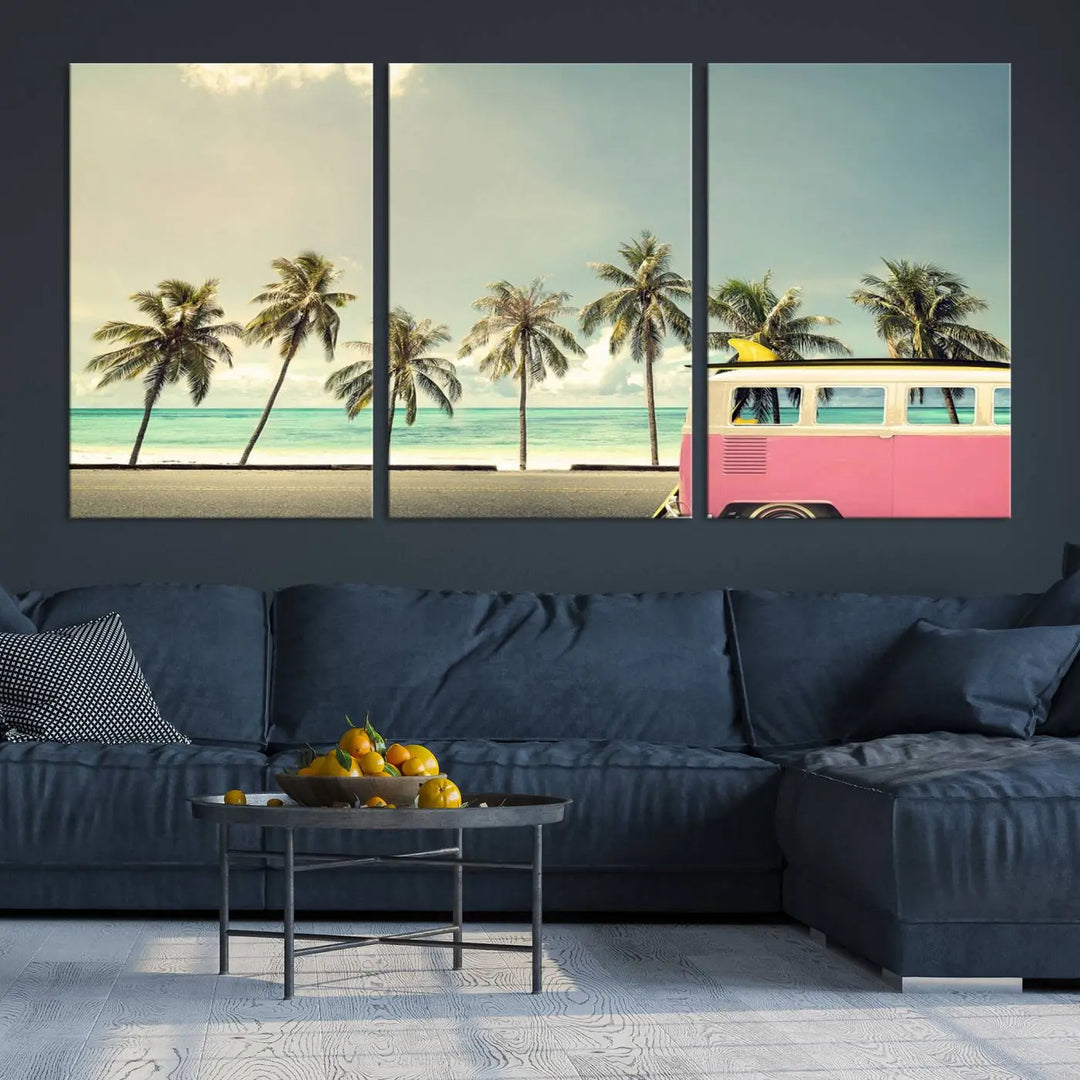 The Nostalgia Lovely Summer Day Canvas Wall Art Print in the modern living room showcases a tropical triptych with palm trees and a vintage van on museum-quality canvases, ready to hang.