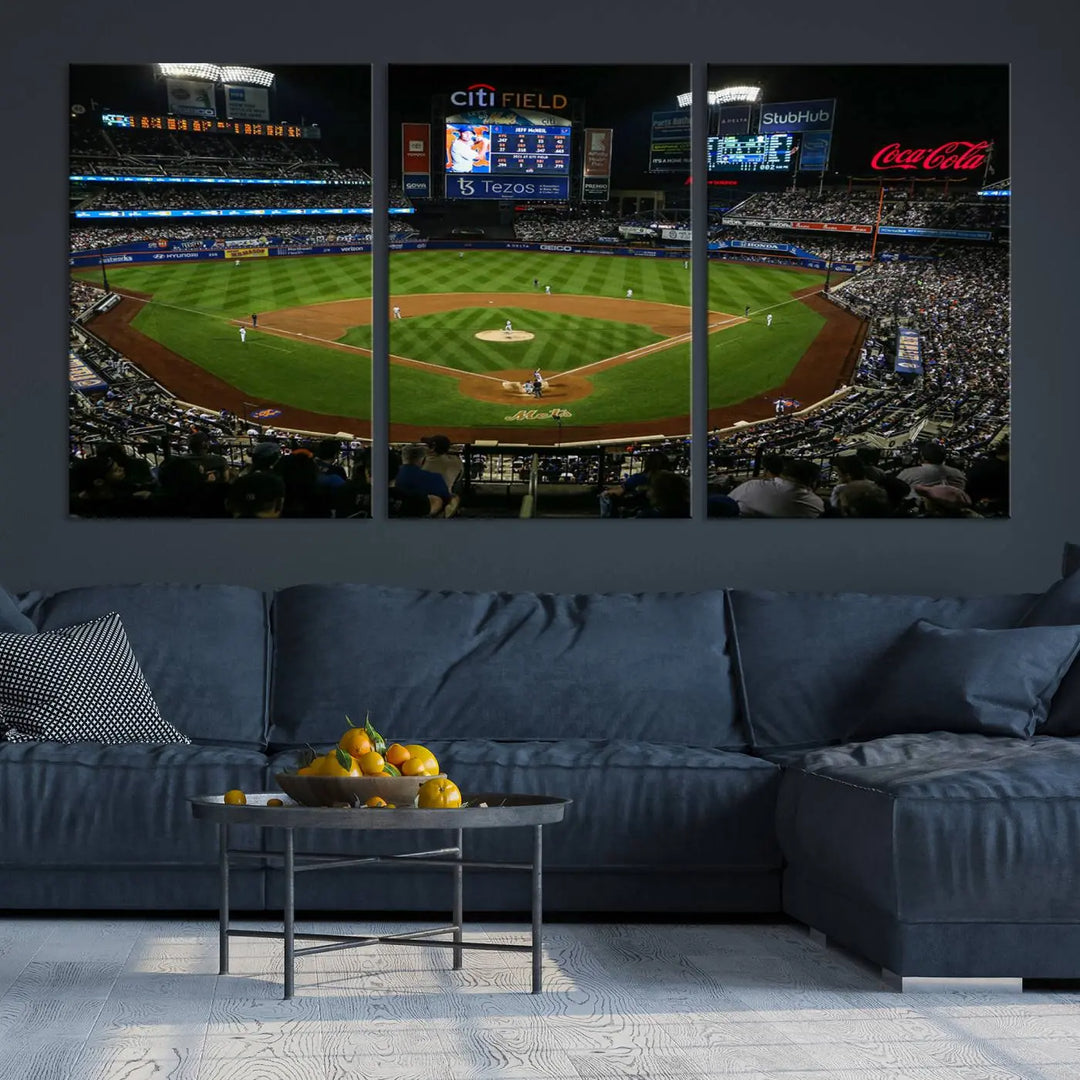 The "Oakland Athletics Baseball Team Print - RingCentral Coliseum Stadium Wall Art Canvas Print" elegantly adorns a modern living room. This stunning three-panel artwork of a baseball stadium at night is crafted on museum-quality canvas, ensuring its vibrant beauty endures over time.