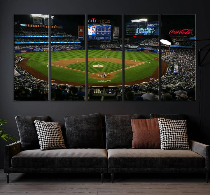 The "Oakland Athletics Baseball Team Print - RingCentral Coliseum Stadium Wall Art Canvas Print" elegantly adorns a modern living room. This stunning three-panel artwork of a baseball stadium at night is crafted on museum-quality canvas, ensuring its vibrant beauty endures over time.