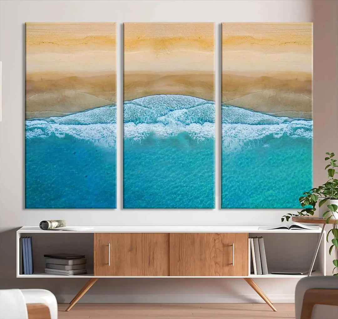 Ocean Aerial Beach Canvas Wall Art Print features a triptych of an aerial beach scene with waves, gallery-wrapped on museum-quality canvas.