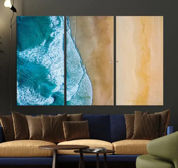 An Ocean Aerial Beach Wall Art Canvas Print, featuring a triptych of beach and ocean photography on museum-quality canvas with UV protection, is ready to hang.