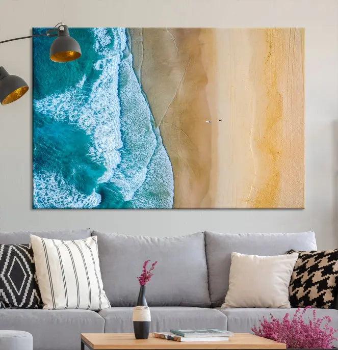 An Ocean Aerial Beach Wall Art Canvas Print, featuring a triptych of beach and ocean photography on museum-quality canvas with UV protection, is ready to hang.