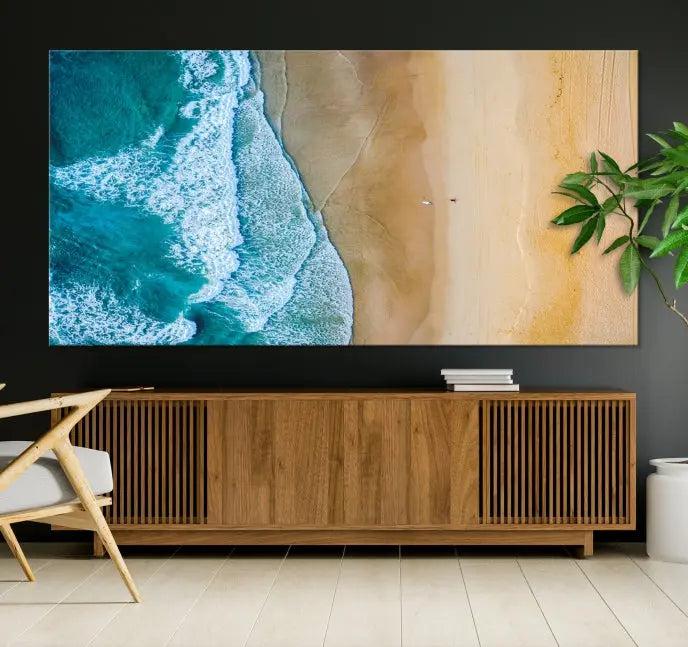 An Ocean Aerial Beach Wall Art Canvas Print, featuring a triptych of beach and ocean photography on museum-quality canvas with UV protection, is ready to hang.