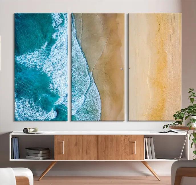 An Ocean Aerial Beach Wall Art Canvas Print, featuring a triptych of beach and ocean photography on museum-quality canvas with UV protection, is ready to hang.