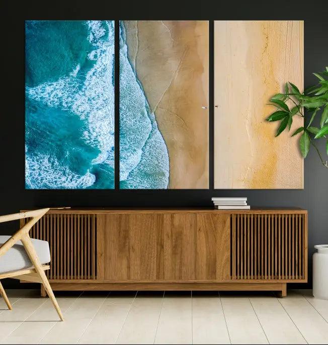 An Ocean Aerial Beach Wall Art Canvas Print, featuring a triptych of beach and ocean photography on museum-quality canvas with UV protection, is ready to hang.