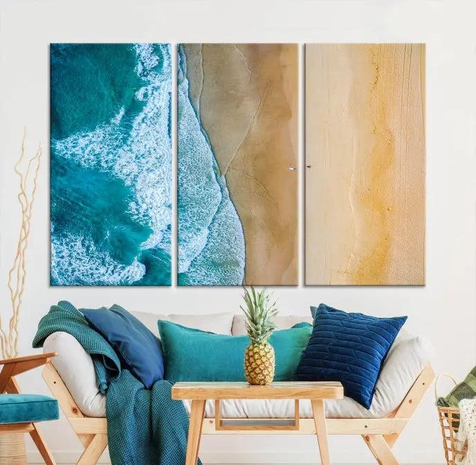 An Ocean Aerial Beach Wall Art Canvas Print, featuring a triptych of beach and ocean photography on museum-quality canvas with UV protection, is ready to hang.