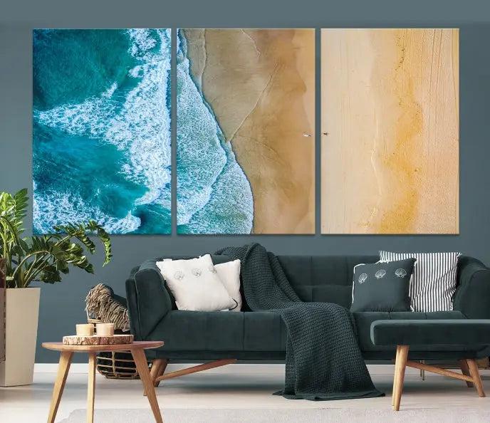 An Ocean Aerial Beach Wall Art Canvas Print, featuring a triptych of beach and ocean photography on museum-quality canvas with UV protection, is ready to hang.