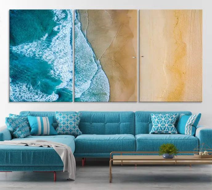 An Ocean Aerial Beach Wall Art Canvas Print, featuring a triptych of beach and ocean photography on museum-quality canvas with UV protection, is ready to hang.