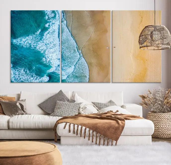 An Ocean Aerial Beach Wall Art Canvas Print, featuring a triptych of beach and ocean photography on museum-quality canvas with UV protection, is ready to hang.