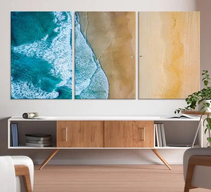 An Ocean Aerial Beach Wall Art Canvas Print, featuring a triptych of beach and ocean photography on museum-quality canvas with UV protection, is ready to hang.