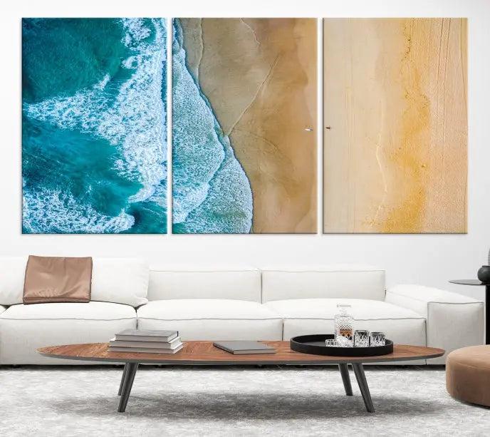 An Ocean Aerial Beach Wall Art Canvas Print, featuring a triptych of beach and ocean photography on museum-quality canvas with UV protection, is ready to hang.