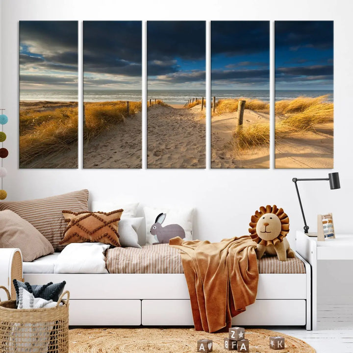 The Ocean Beach Dark Clouds Wall Art Canvas Print is a breathtaking triptych depicting a sandy beach path with tall grasses under an intense cloudy sky. It is crafted on museum-quality canvas with UV protection.