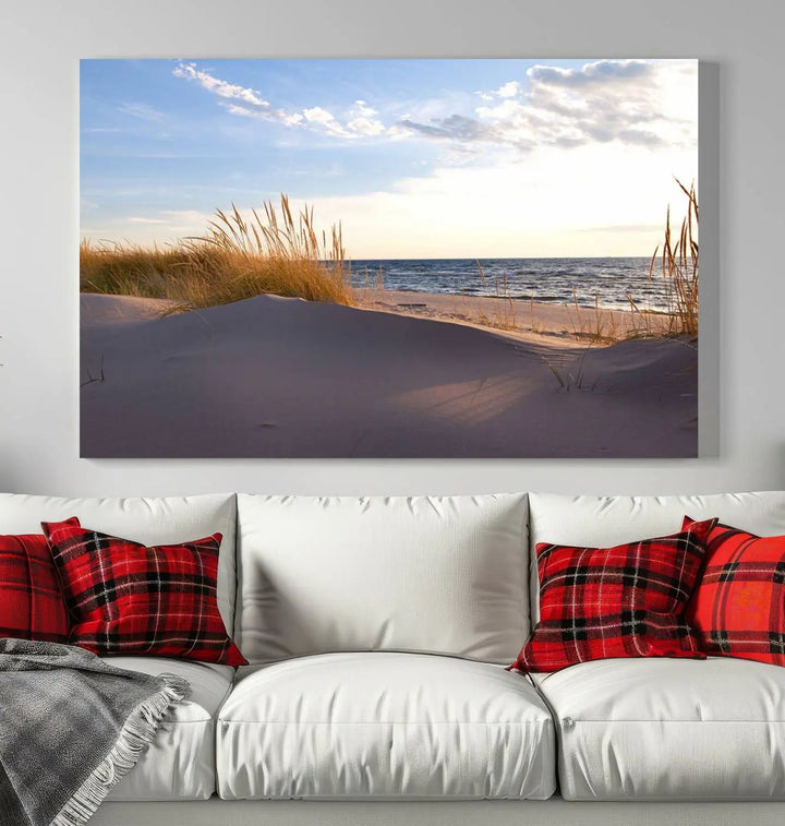 The living room showcases the Ocean Beach Wall Art Canvas Print Sunset Artwork Print Coastal Wall Art—a triptych wall art featuring a beach scene at sunset. Each museum-quality canvas piece is ready to hang and includes a UV-protective coating to preserve its stunning beauty.