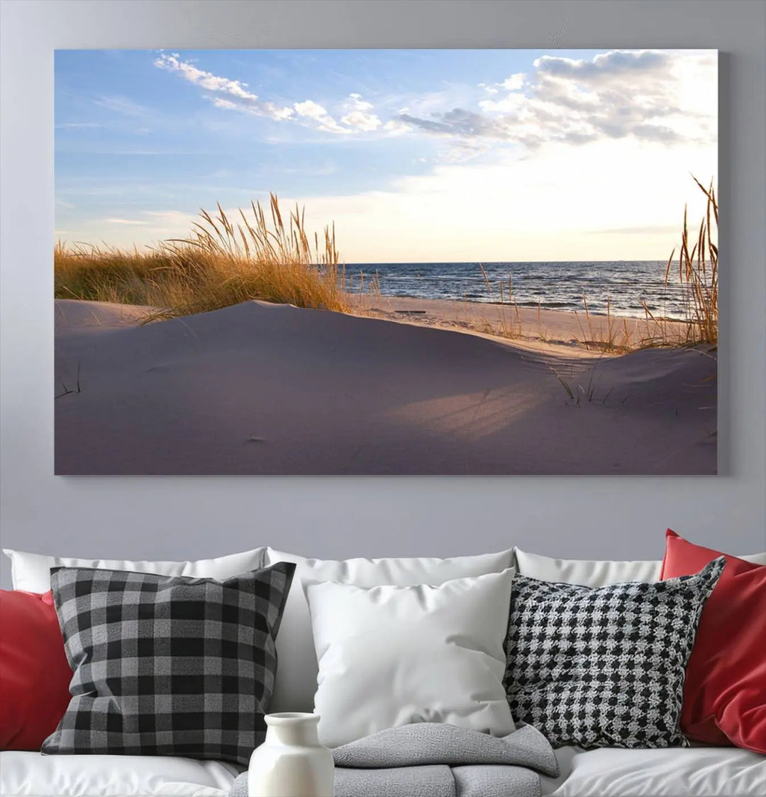 The living room showcases the Ocean Beach Wall Art Canvas Print Sunset Artwork Print Coastal Wall Art—a triptych wall art featuring a beach scene at sunset. Each museum-quality canvas piece is ready to hang and includes a UV-protective coating to preserve its stunning beauty.