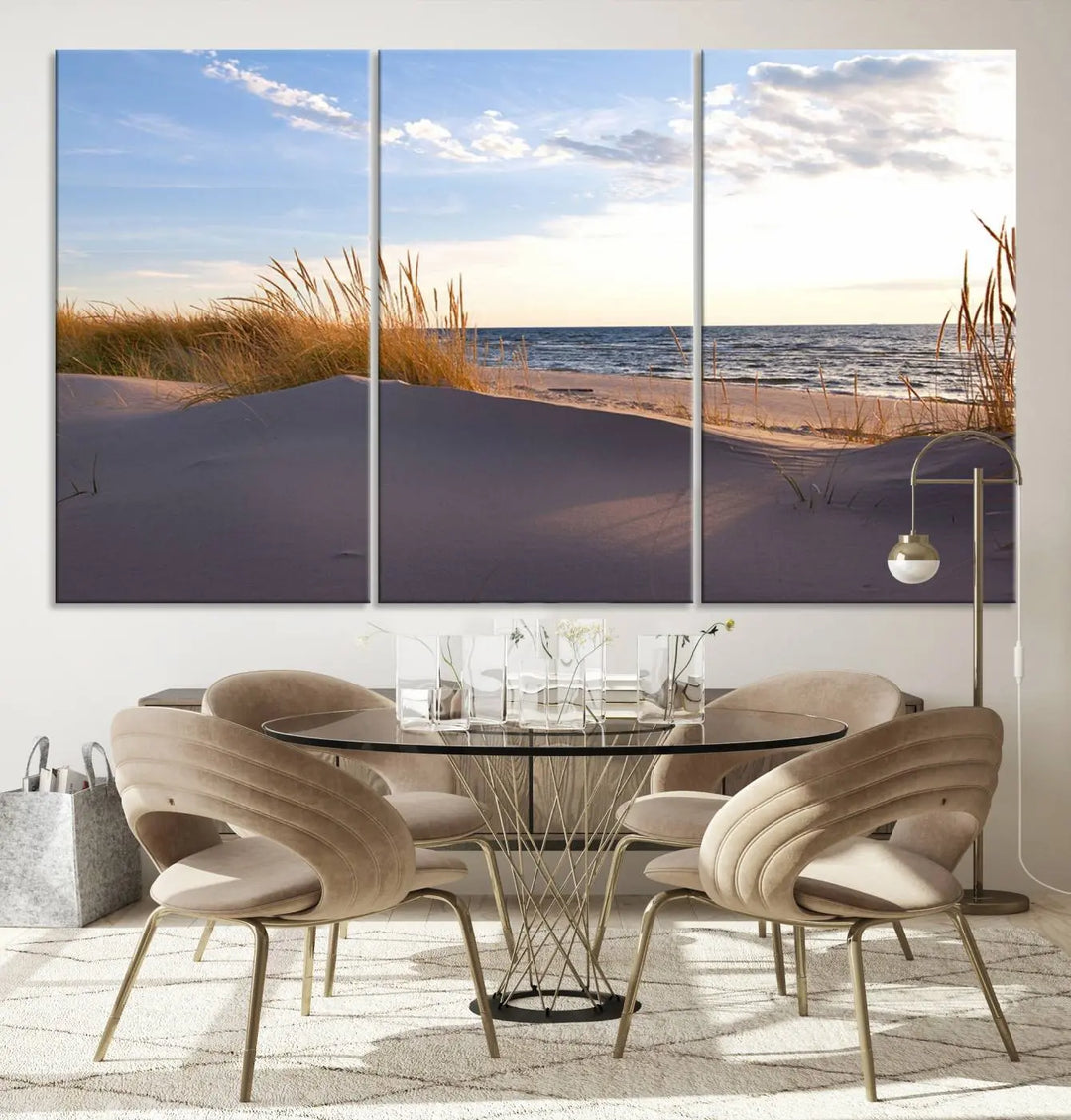 The living room showcases the Ocean Beach Wall Art Canvas Print Sunset Artwork Print Coastal Wall Art—a triptych wall art featuring a beach scene at sunset. Each museum-quality canvas piece is ready to hang and includes a UV-protective coating to preserve its stunning beauty.