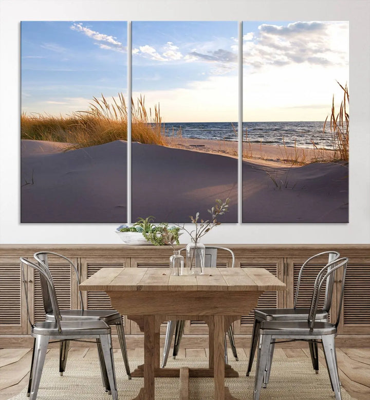 The living room showcases the Ocean Beach Wall Art Canvas Print Sunset Artwork Print Coastal Wall Art—a triptych wall art featuring a beach scene at sunset. Each museum-quality canvas piece is ready to hang and includes a UV-protective coating to preserve its stunning beauty.