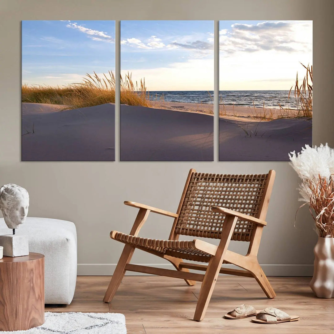 The living room showcases the Ocean Beach Wall Art Canvas Print Sunset Artwork Print Coastal Wall Art—a triptych wall art featuring a beach scene at sunset. Each museum-quality canvas piece is ready to hang and includes a UV-protective coating to preserve its stunning beauty.