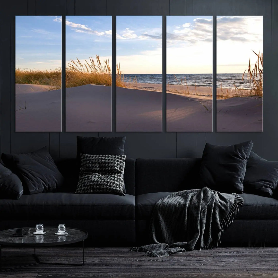 The living room showcases the Ocean Beach Wall Art Canvas Print Sunset Artwork Print Coastal Wall Art—a triptych wall art featuring a beach scene at sunset. Each museum-quality canvas piece is ready to hang and includes a UV-protective coating to preserve its stunning beauty.