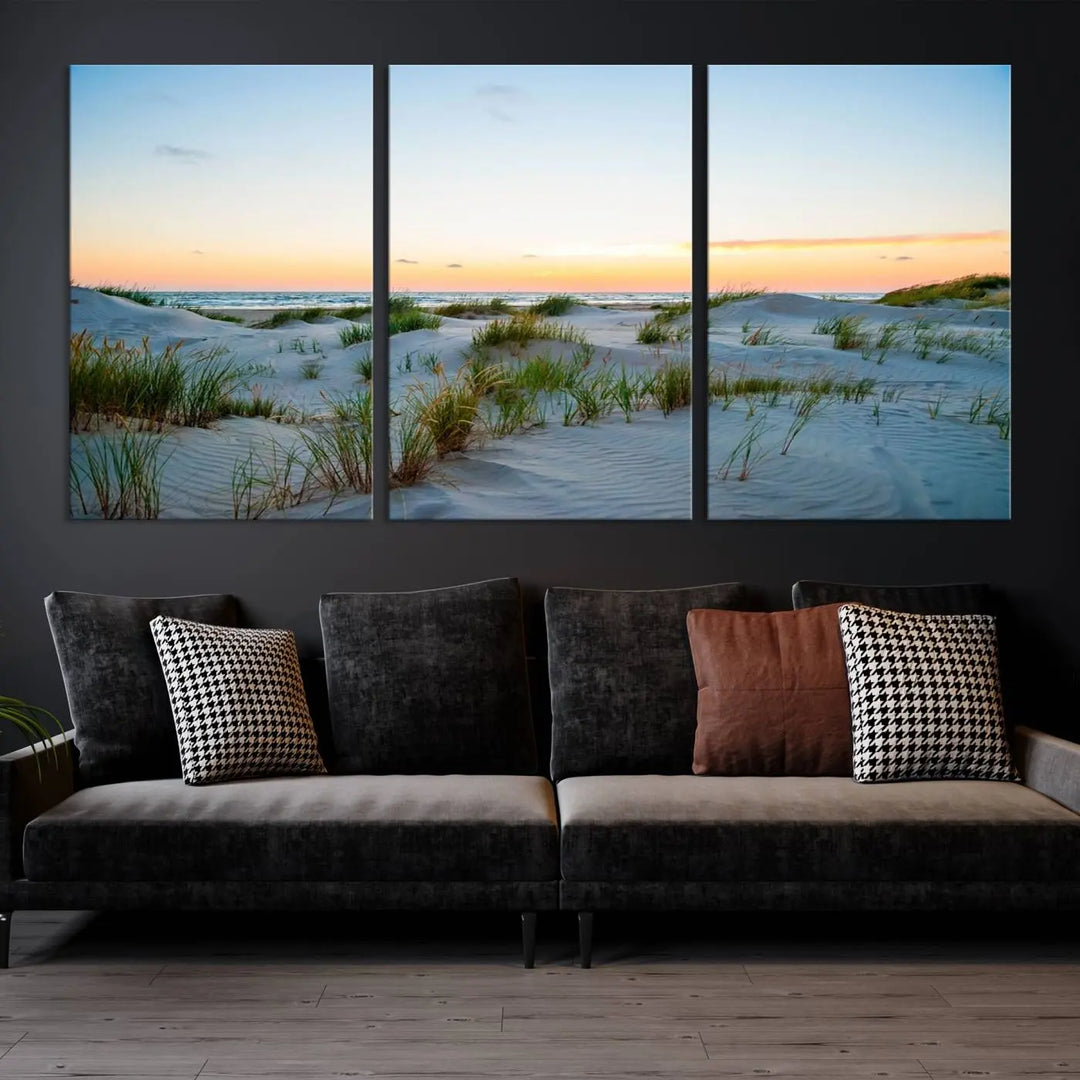 The "Ocean Beach Wall Art Canvas Print Sunset Artwork Print Coastal Wall Art" brings a sense of tranquility to the space. Crafted on museum-quality canvas and featuring gallery-wrapped edges, this modern living room piece is protected by a UV coating to ensure its lasting beauty.