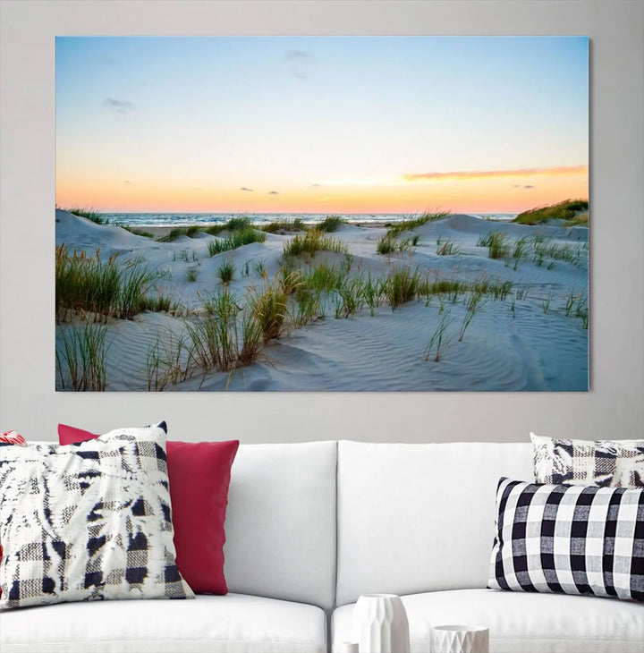 The "Ocean Beach Wall Art Canvas Print Sunset Artwork Print Coastal Wall Art" brings a sense of tranquility to the space. Crafted on museum-quality canvas and featuring gallery-wrapped edges, this modern living room piece is protected by a UV coating to ensure its lasting beauty.