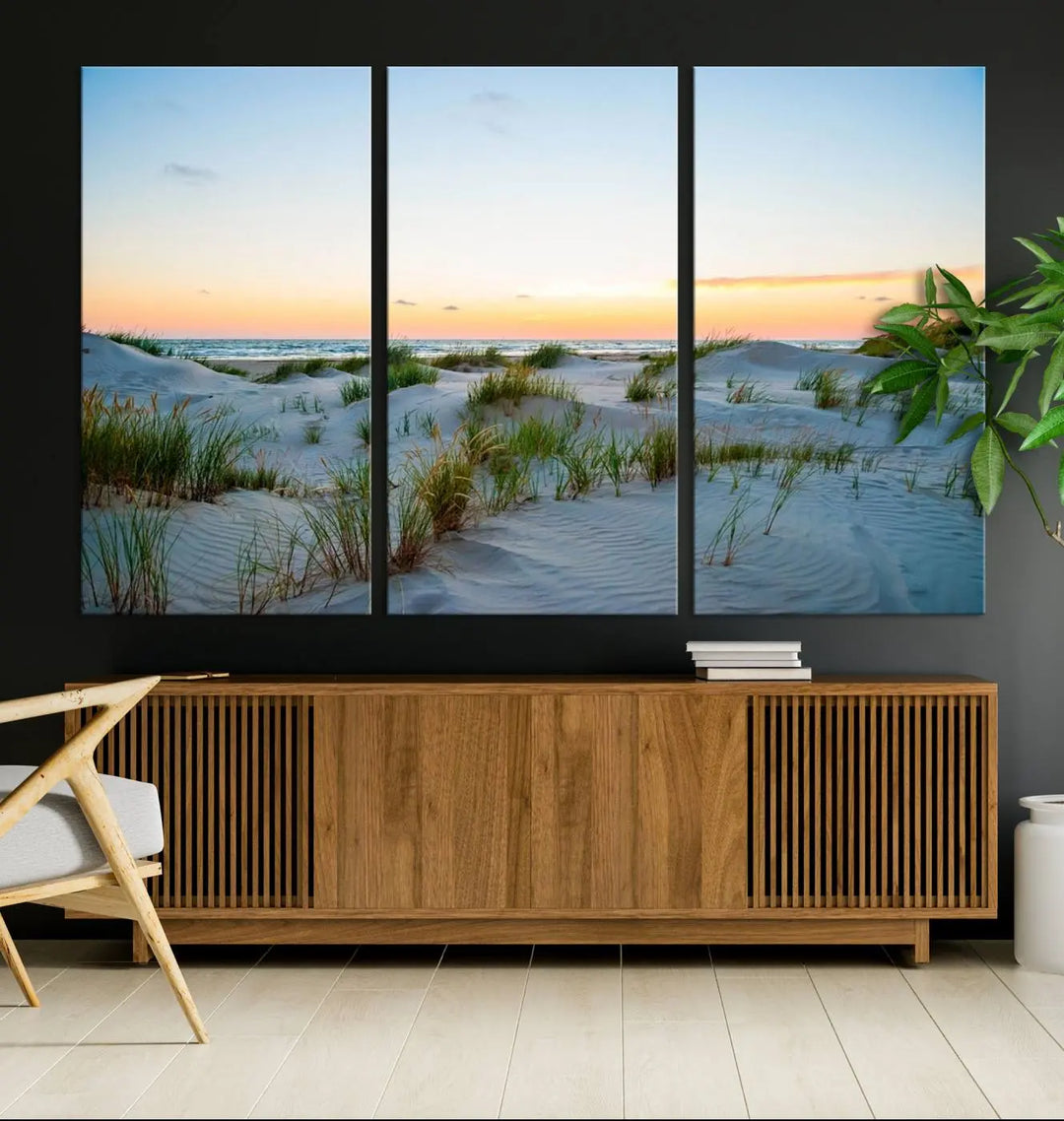 The "Ocean Beach Wall Art Canvas Print Sunset Artwork Print Coastal Wall Art" brings a sense of tranquility to the space. Crafted on museum-quality canvas and featuring gallery-wrapped edges, this modern living room piece is protected by a UV coating to ensure its lasting beauty.