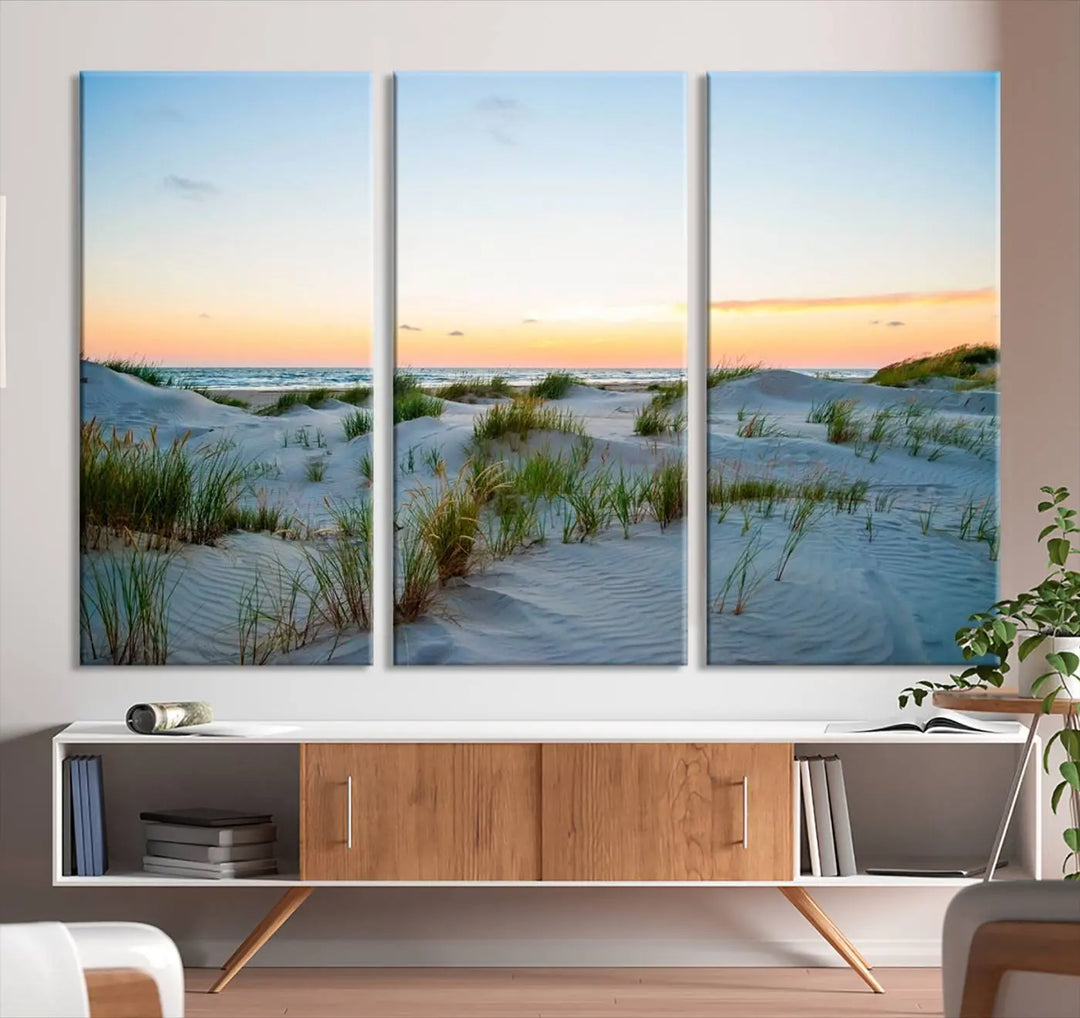 The "Ocean Beach Wall Art Canvas Print Sunset Artwork Print Coastal Wall Art" brings a sense of tranquility to the space. Crafted on museum-quality canvas and featuring gallery-wrapped edges, this modern living room piece is protected by a UV coating to ensure its lasting beauty.