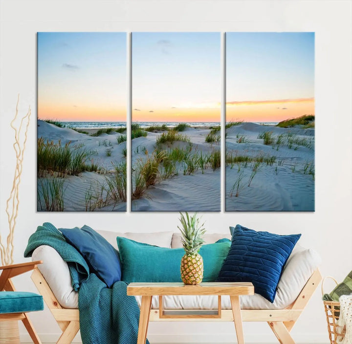 The "Ocean Beach Wall Art Canvas Print Sunset Artwork Print Coastal Wall Art" brings a sense of tranquility to the space. Crafted on museum-quality canvas and featuring gallery-wrapped edges, this modern living room piece is protected by a UV coating to ensure its lasting beauty.