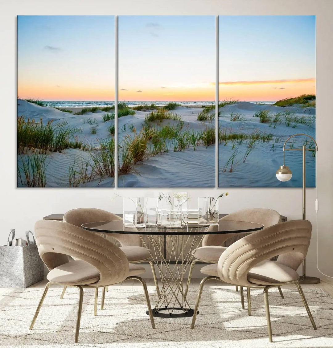 The "Ocean Beach Wall Art Canvas Print Sunset Artwork Print Coastal Wall Art" brings a sense of tranquility to the space. Crafted on museum-quality canvas and featuring gallery-wrapped edges, this modern living room piece is protected by a UV coating to ensure its lasting beauty.