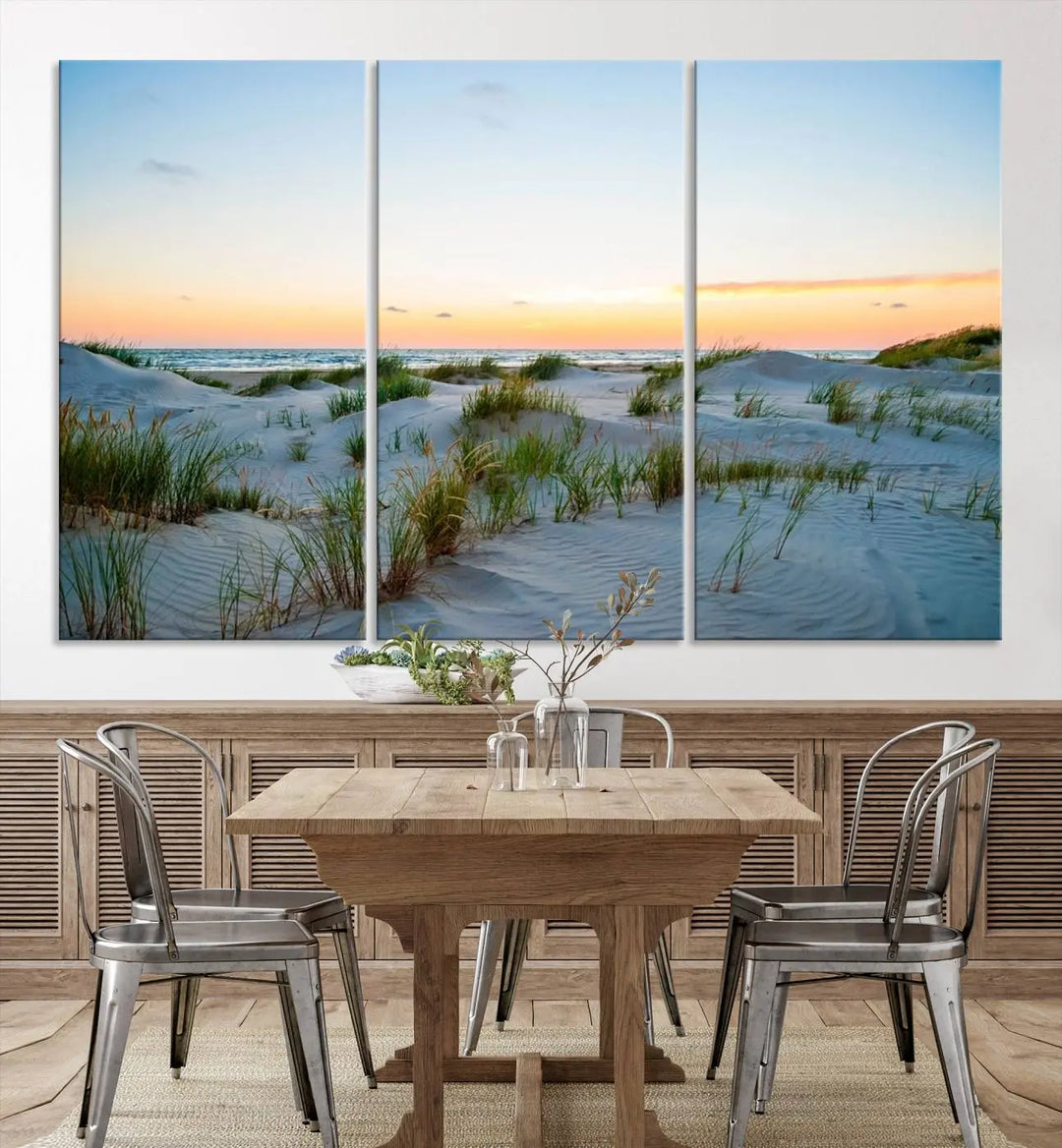 The "Ocean Beach Wall Art Canvas Print Sunset Artwork Print Coastal Wall Art" brings a sense of tranquility to the space. Crafted on museum-quality canvas and featuring gallery-wrapped edges, this modern living room piece is protected by a UV coating to ensure its lasting beauty.