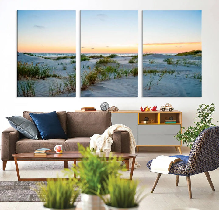 The "Ocean Beach Wall Art Canvas Print Sunset Artwork Print Coastal Wall Art" brings a sense of tranquility to the space. Crafted on museum-quality canvas and featuring gallery-wrapped edges, this modern living room piece is protected by a UV coating to ensure its lasting beauty.