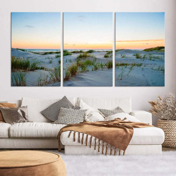 The "Ocean Beach Wall Art Canvas Print Sunset Artwork Print Coastal Wall Art" brings a sense of tranquility to the space. Crafted on museum-quality canvas and featuring gallery-wrapped edges, this modern living room piece is protected by a UV coating to ensure its lasting beauty.