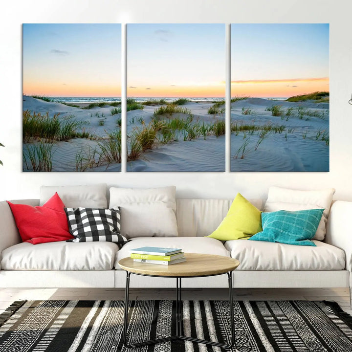 The "Ocean Beach Wall Art Canvas Print Sunset Artwork Print Coastal Wall Art" brings a sense of tranquility to the space. Crafted on museum-quality canvas and featuring gallery-wrapped edges, this modern living room piece is protected by a UV coating to ensure its lasting beauty.