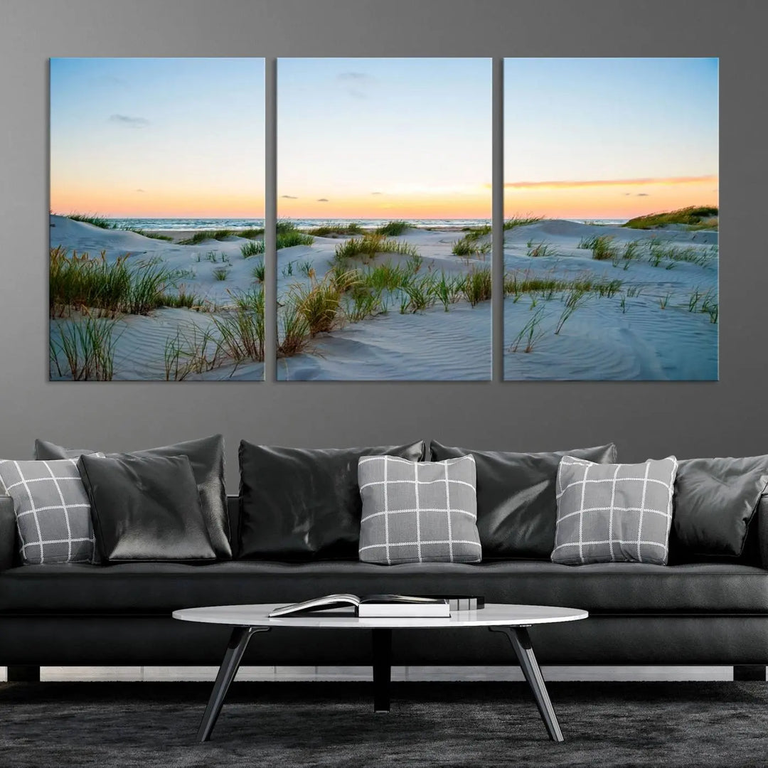 The "Ocean Beach Wall Art Canvas Print Sunset Artwork Print Coastal Wall Art" brings a sense of tranquility to the space. Crafted on museum-quality canvas and featuring gallery-wrapped edges, this modern living room piece is protected by a UV coating to ensure its lasting beauty.