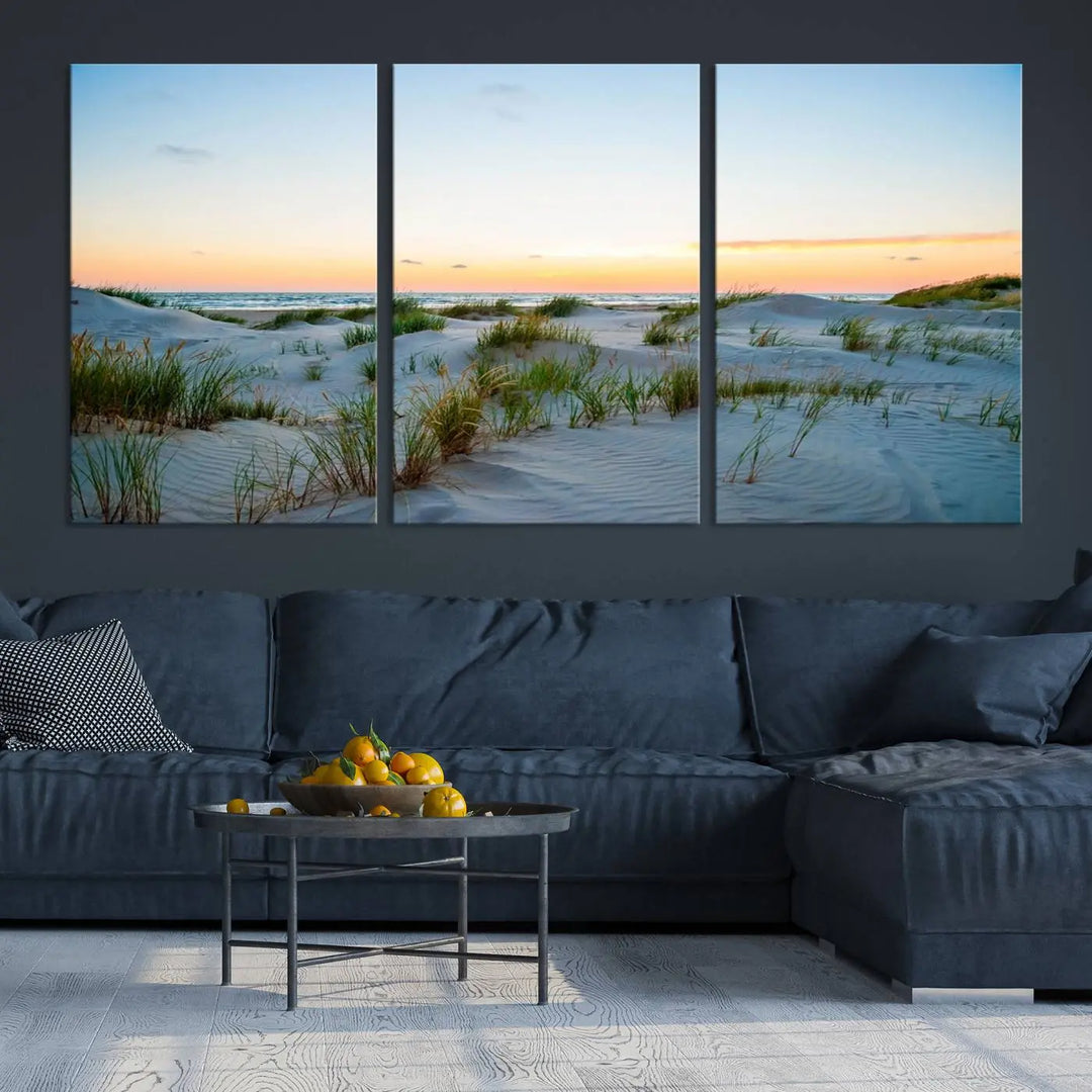 The "Ocean Beach Wall Art Canvas Print Sunset Artwork Print Coastal Wall Art" brings a sense of tranquility to the space. Crafted on museum-quality canvas and featuring gallery-wrapped edges, this modern living room piece is protected by a UV coating to ensure its lasting beauty.