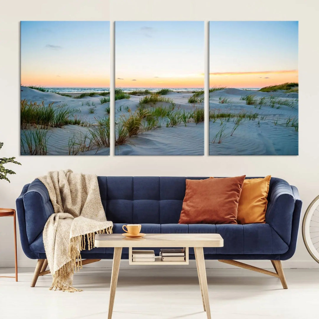 The "Ocean Beach Wall Art Canvas Print Sunset Artwork Print Coastal Wall Art" brings a sense of tranquility to the space. Crafted on museum-quality canvas and featuring gallery-wrapped edges, this modern living room piece is protected by a UV coating to ensure its lasting beauty.