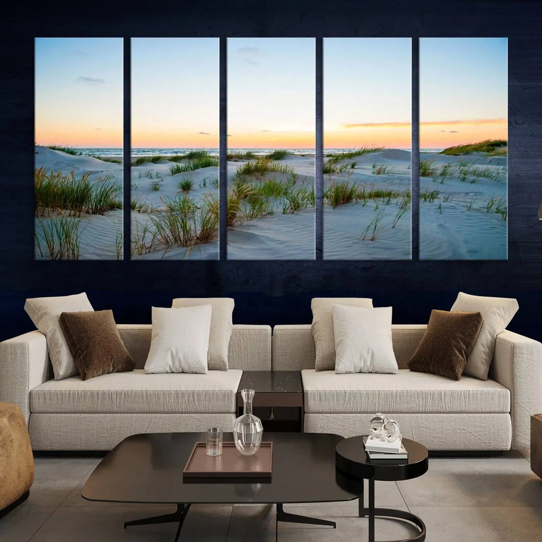 The "Ocean Beach Wall Art Canvas Print Sunset Artwork Print Coastal Wall Art" brings a sense of tranquility to the space. Crafted on museum-quality canvas and featuring gallery-wrapped edges, this modern living room piece is protected by a UV coating to ensure its lasting beauty.