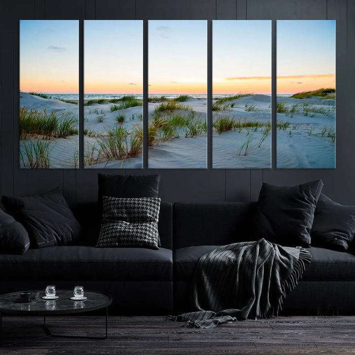 The "Ocean Beach Wall Art Canvas Print Sunset Artwork Print Coastal Wall Art" brings a sense of tranquility to the space. Crafted on museum-quality canvas and featuring gallery-wrapped edges, this modern living room piece is protected by a UV coating to ensure its lasting beauty.