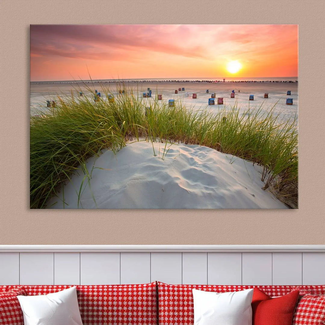 The Ocean Beach Wall Art Canvas Print beautifully captures a sunset over the beach and adds a coastal decor vibe to the space.