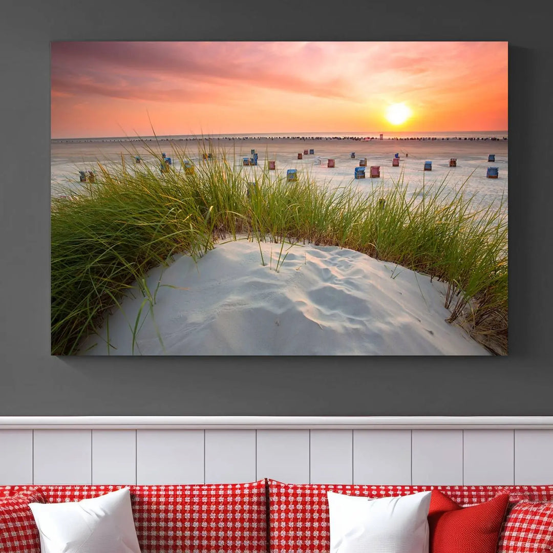 The Ocean Beach Wall Art Canvas Print beautifully captures a sunset over the beach and adds a coastal decor vibe to the space.