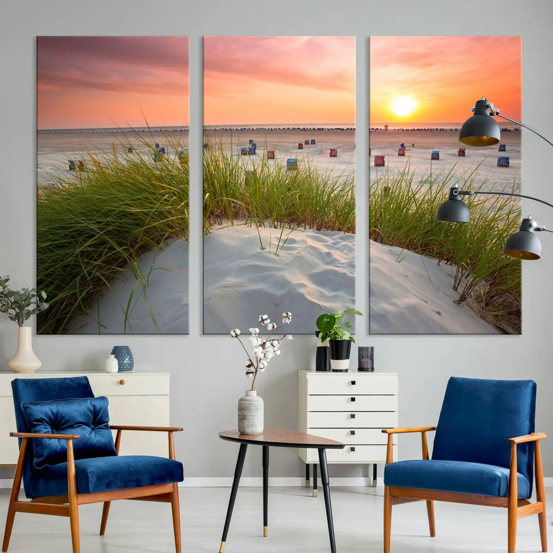 The Ocean Beach Wall Art Canvas Print beautifully captures a sunset over the beach and adds a coastal decor vibe to the space.