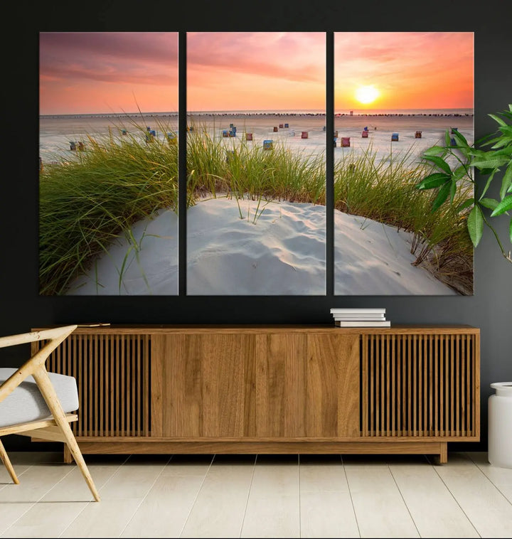 The Ocean Beach Wall Art Canvas Print beautifully captures a sunset over the beach and adds a coastal decor vibe to the space.