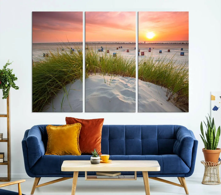 The Ocean Beach Wall Art Canvas Print beautifully captures a sunset over the beach and adds a coastal decor vibe to the space.