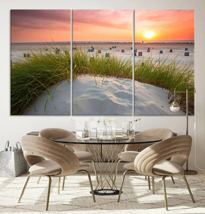 The Ocean Beach Wall Art Canvas Print beautifully captures a sunset over the beach and adds a coastal decor vibe to the space.