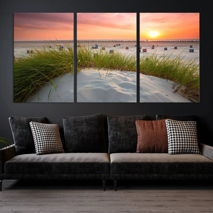 The Ocean Beach Wall Art Canvas Print beautifully captures a sunset over the beach and adds a coastal decor vibe to the space.