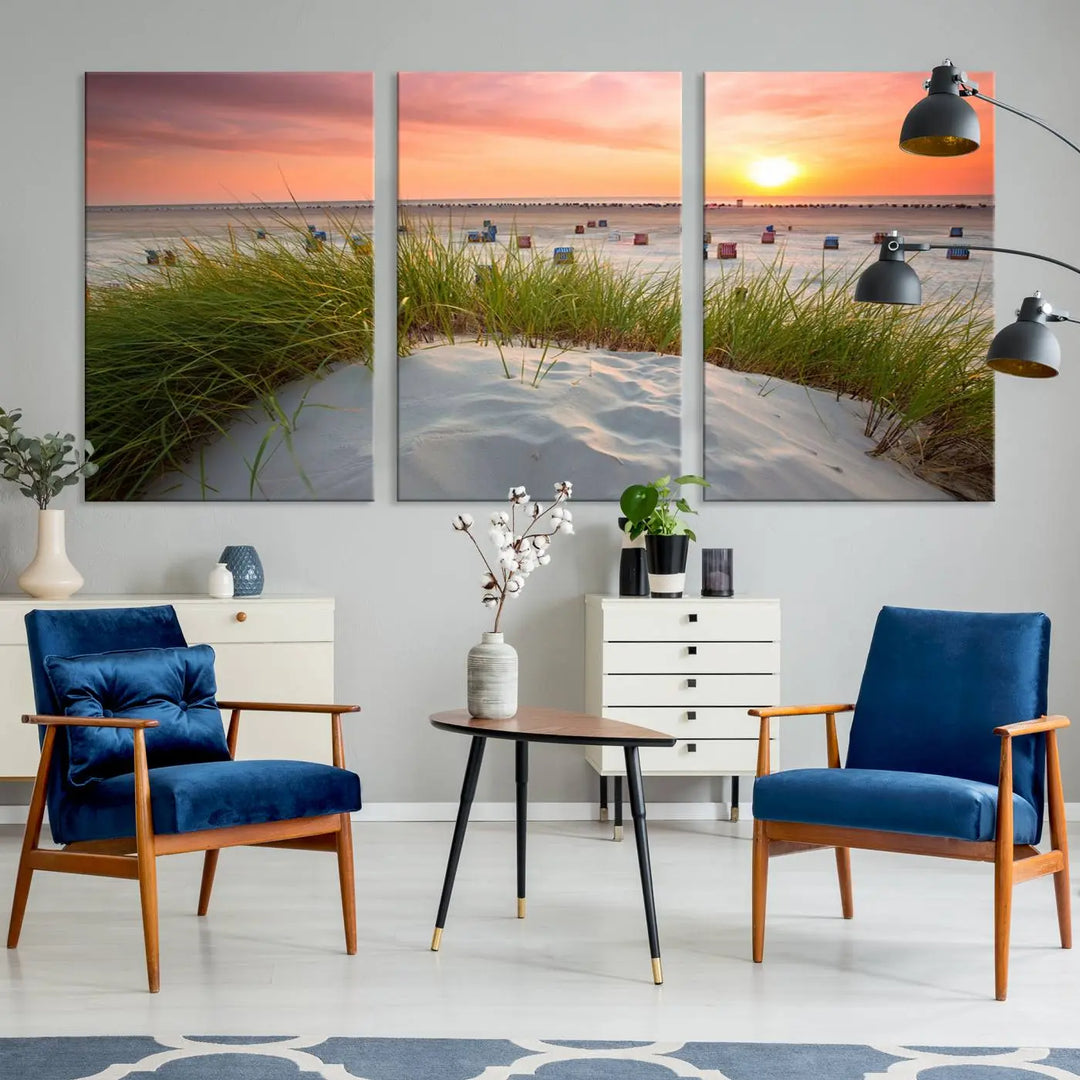 The Ocean Beach Wall Art Canvas Print beautifully captures a sunset over the beach and adds a coastal decor vibe to the space.